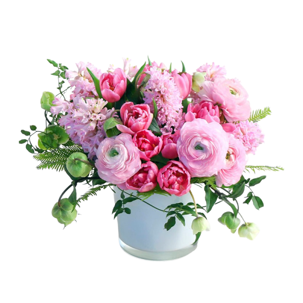 Pink floral arrangement in a white vase