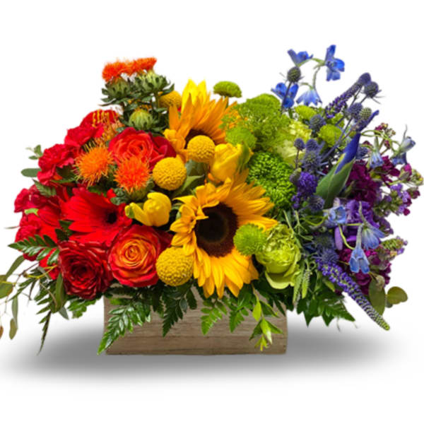 Colorful mixed bouquet in a wooden box with sunflowers and roses