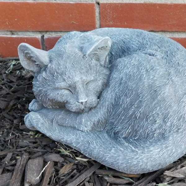 CURLED CAT STATUE