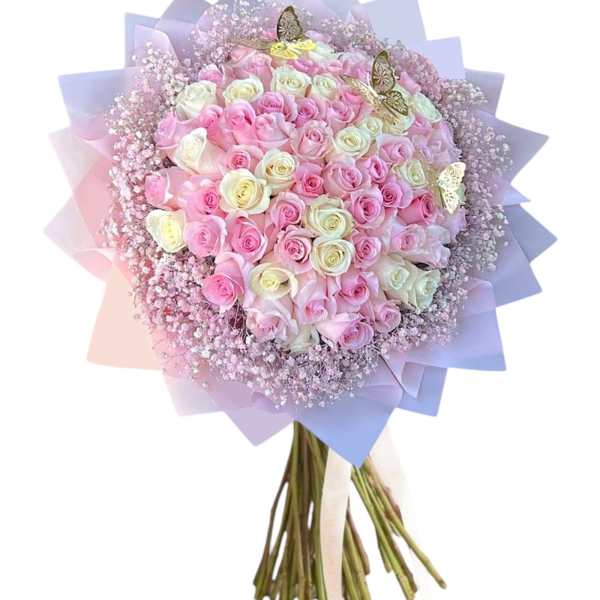 Bouquet of pink and white roses wrapped in pastel paper