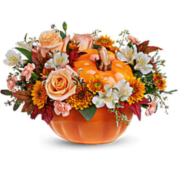 Pumpkin-shaped container with orange and white flowers