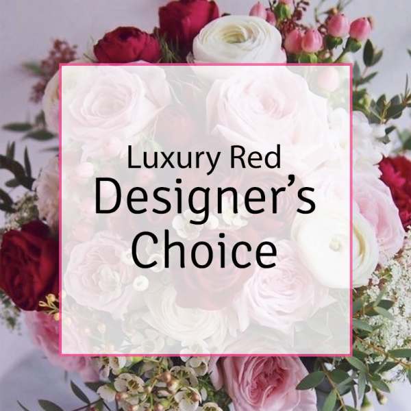 Bouquet of red and white roses with pink flowers and greenery