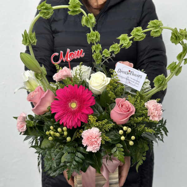 Pink and white mixed bouquet in a gift box with a heart-shaped green accent