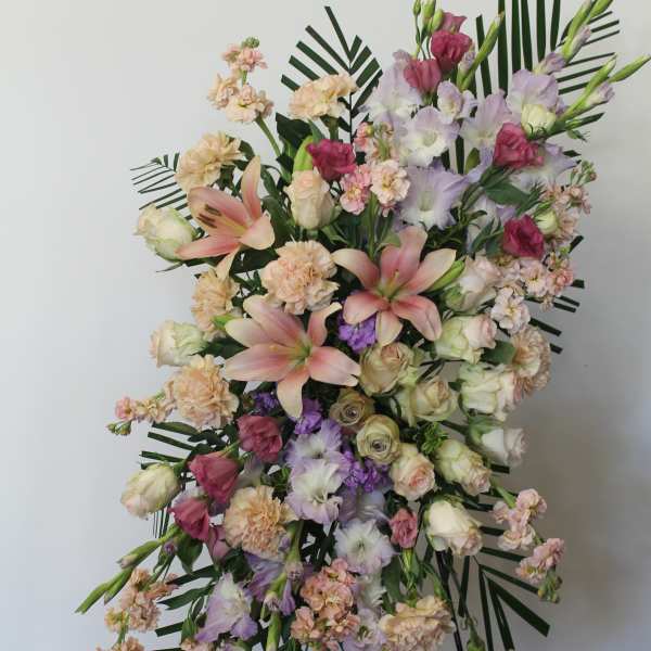 On the Angeles Wings Funeral Spray