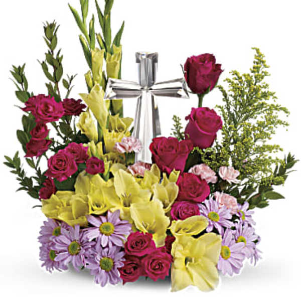 Bouquet of magenta roses, yellow calla lilies, and lavender daisies with a silver ribbon