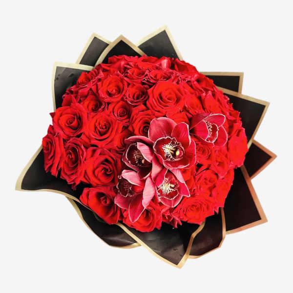 Red rose bouquet with pink orchids wrapped in black paper