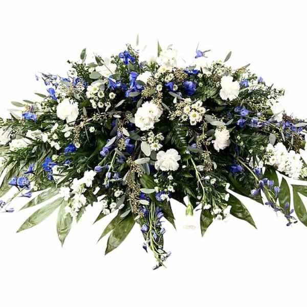 Large white and blue floral spray with greenery