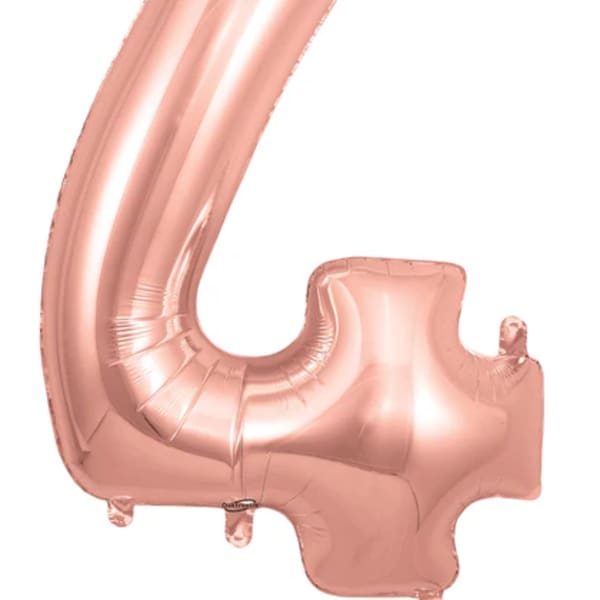 Rose gold foil balloon shaped like the number 4