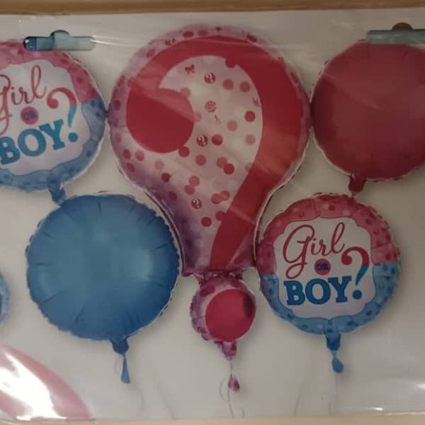 Packaged pink and blue gender-reveal balloons with "Girl or Boy?" text