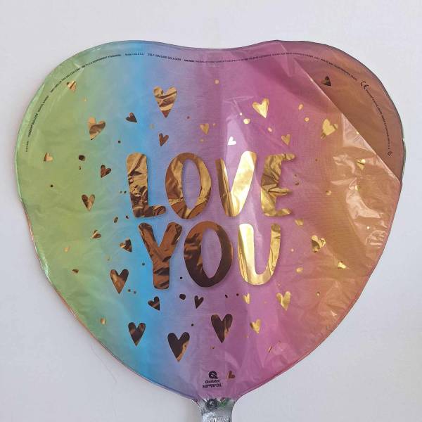 Heart-shaped rainbow balloon with gold "LOVE YOU" text