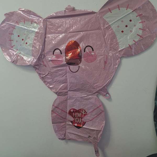 Pink koala-shaped foil balloon with a heart that says I LOVE YOU