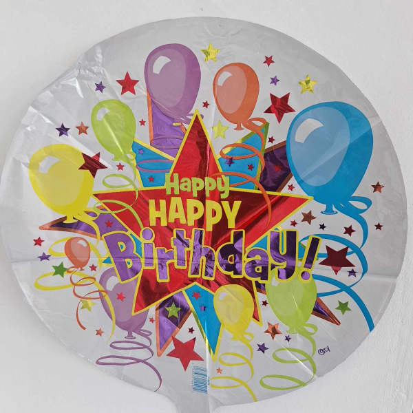 Round birthday balloon with colorful balloons and stars