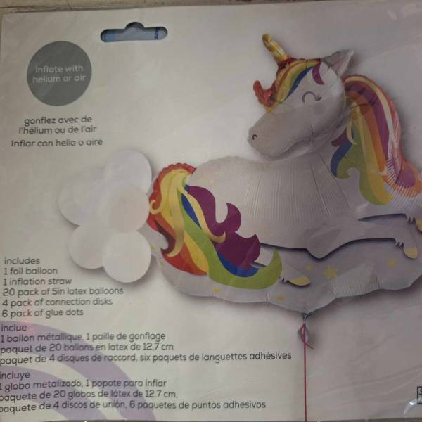 Unicorn-shaped foil balloon package with rainbow accents and cloud balloons
