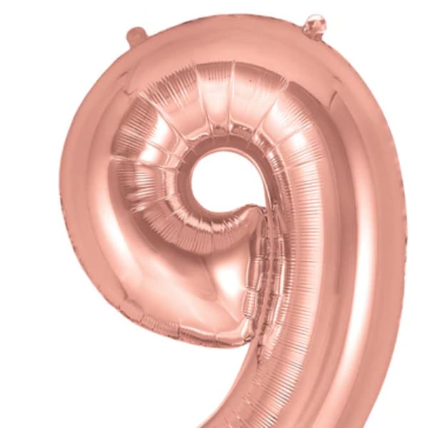 Rose gold number 9 foil balloon on a white background