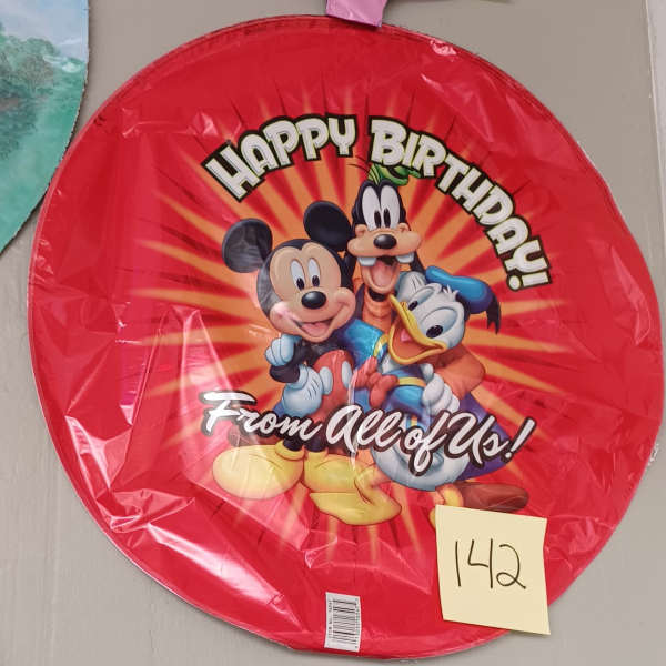 Red birthday balloon with Mickey Mouse, Goofy, and Donald Duck