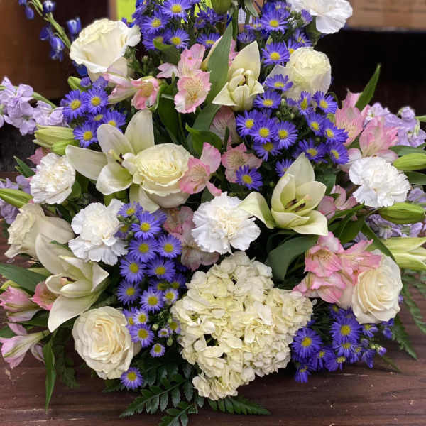 Large bouquet of white, pink, and purple flowers
