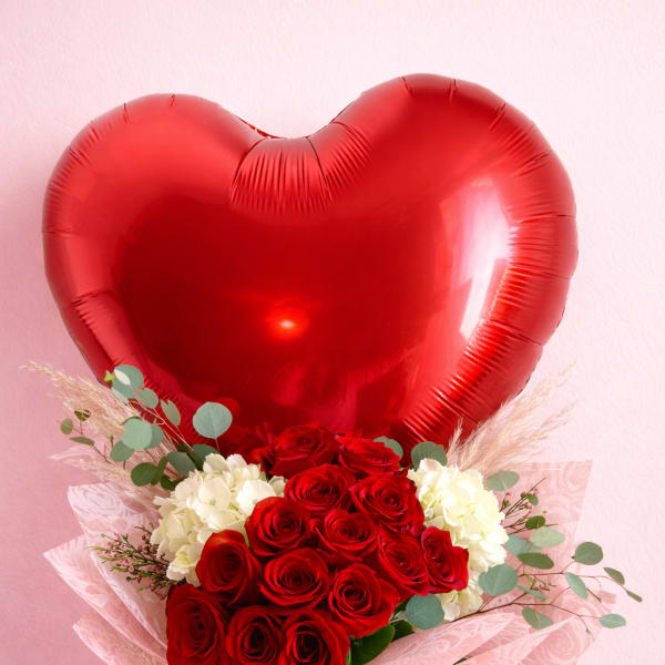Red rose bouquet with a heart-shaped red balloon