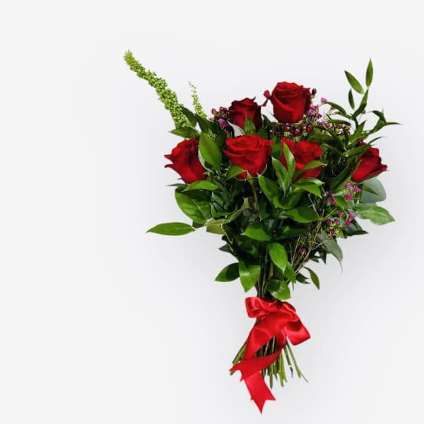 Bouquet of red roses tied with a red ribbon