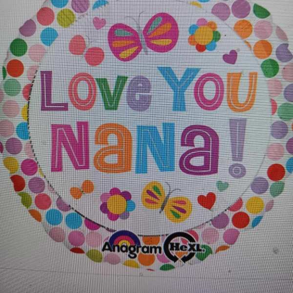 Round balloon with colorful polka dots and "Love You Nana!" text