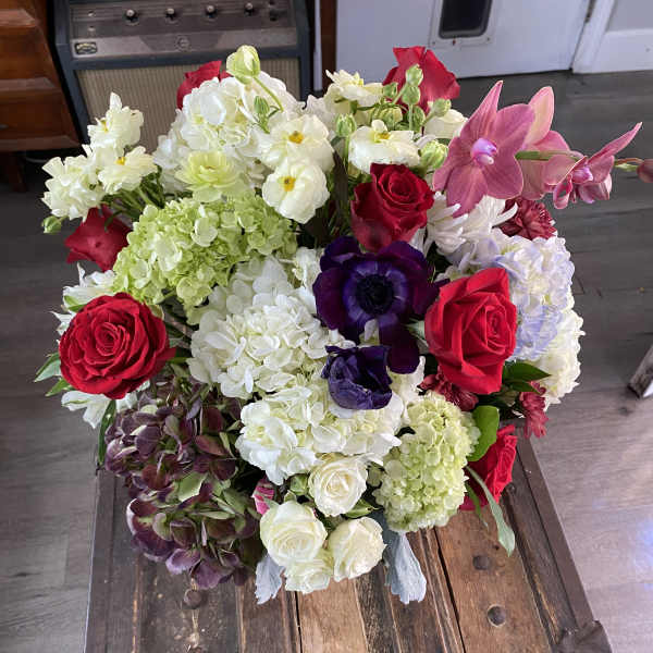 Mixed bouquet of red, white, pink, and purple flowers