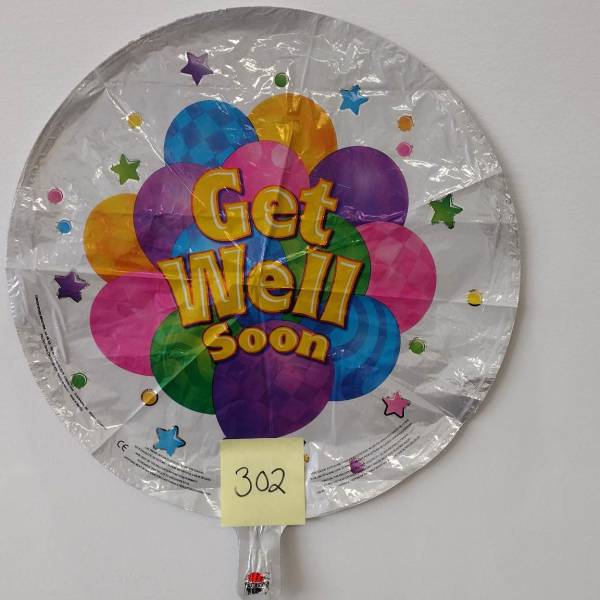 Round foil balloon reading "Get Well Soon" in bright colors