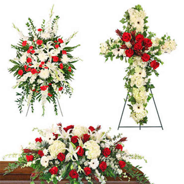 Floral funeral casket spray and standing cross arrangements in red and white