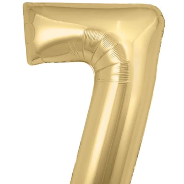 Gold foil balloon shaped like the number 7