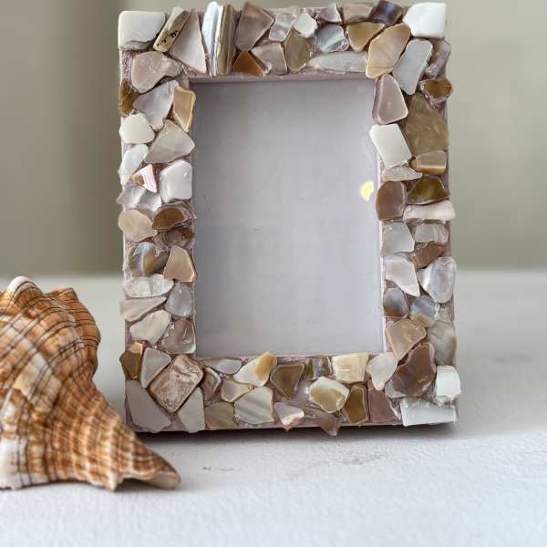 Mosaic seashell photo frame with an empty center