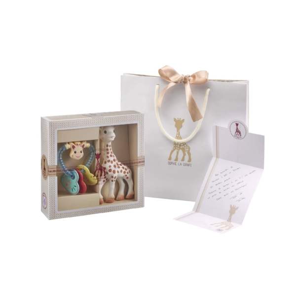 Baby gift set with Sophie la Girafe toy in box, matching gift bag, and folded card