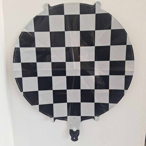 Round black and white checkered foil balloon