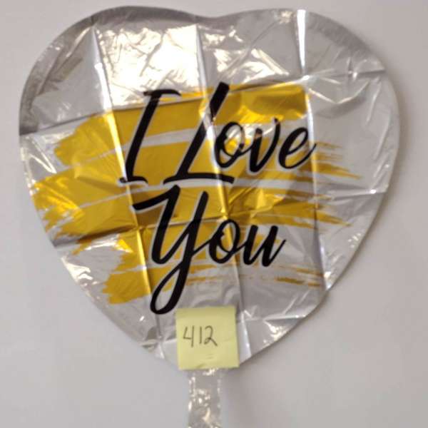 Heart-shaped silver balloon with "I Love You" text and yellow accents