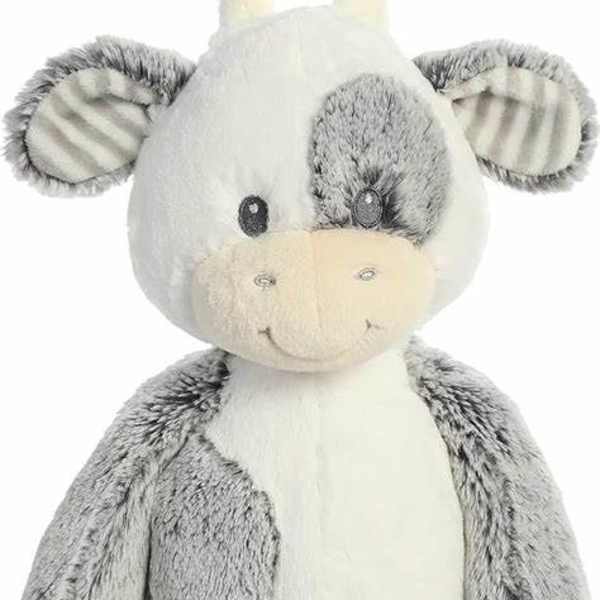 Gray and white plush cow stuffed animal with a smiling face