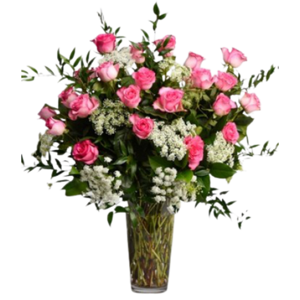 Tall glass vase arrangement with pink roses and white accent flowers