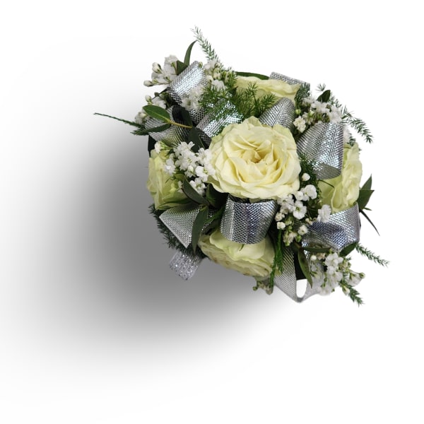 Bouquet of pale yellow roses with white filler flowers and silver ribbon