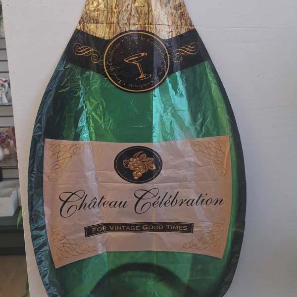 Champagne bottle-shaped foil balloon with gold, green, and black design