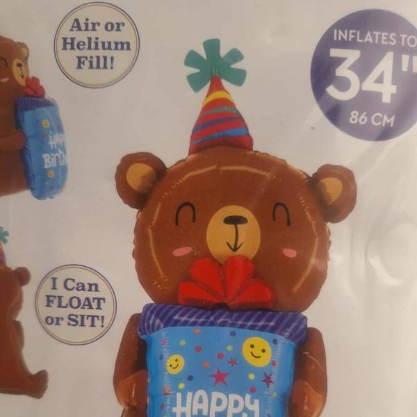 Birthday bear balloon holding a blue "Happy Birthday" gift