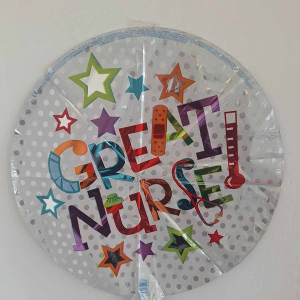 Round foil balloon with colorful "Great Nurse" text and stars