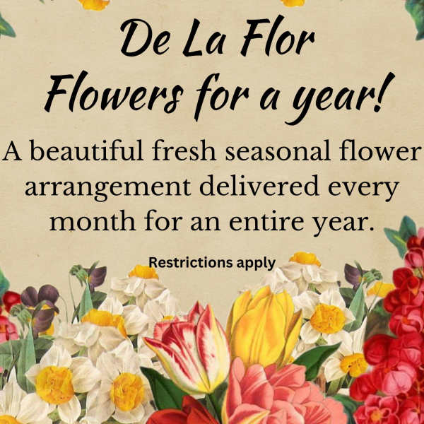 Floral promotional sign with colorful flowers around text
