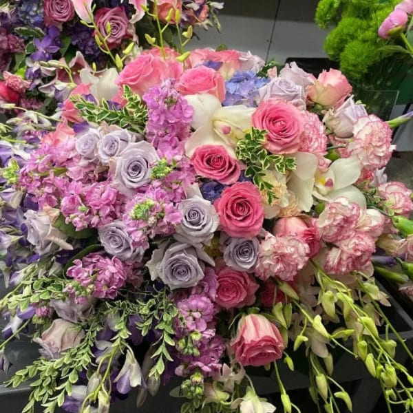 Large bouquet of pink, lavender, and white flowers