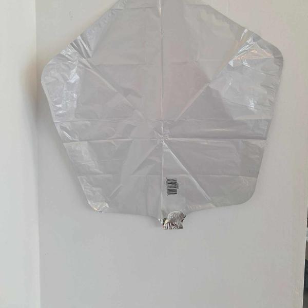 Silver foil balloon shaped like a leaf or tree