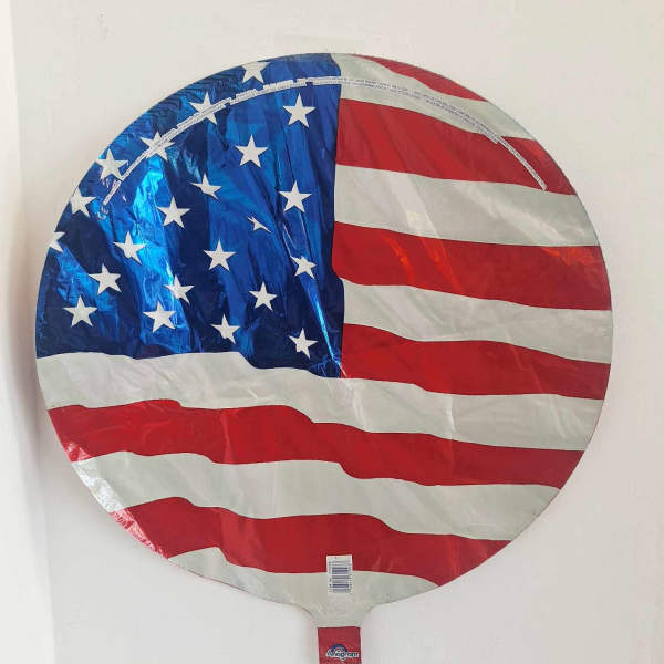 Round foil balloon printed with the U.S. flag