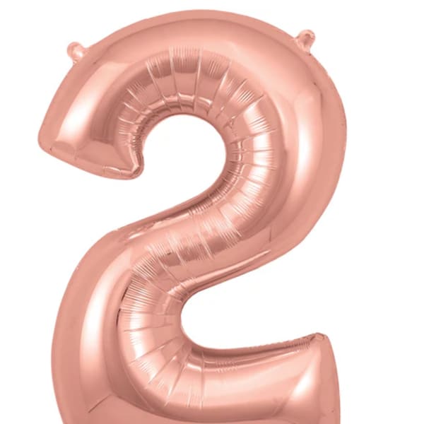 Rose gold foil balloon shaped like the number 2