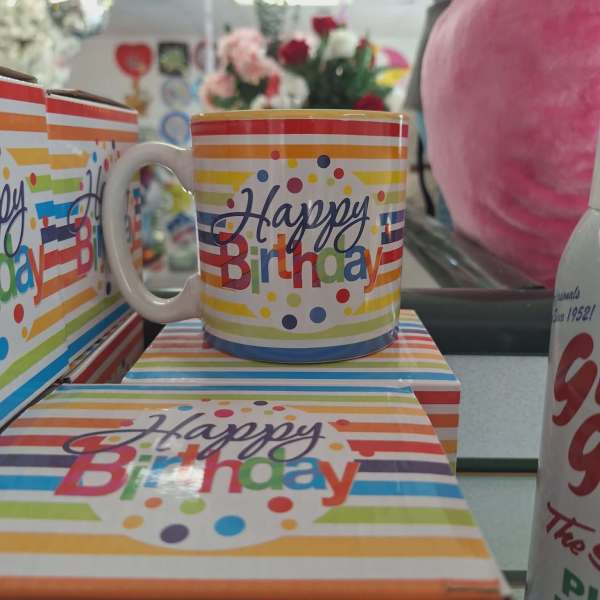 Birthday mug and matching gift box with colorful stripes and polka dots