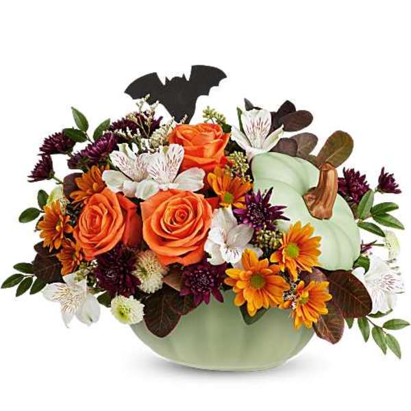 Pumpkin-shaped arrangement with orange roses and autumn flowers