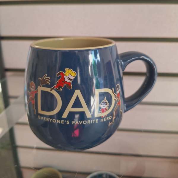 Blue mug with "DAD" text and superhero characters