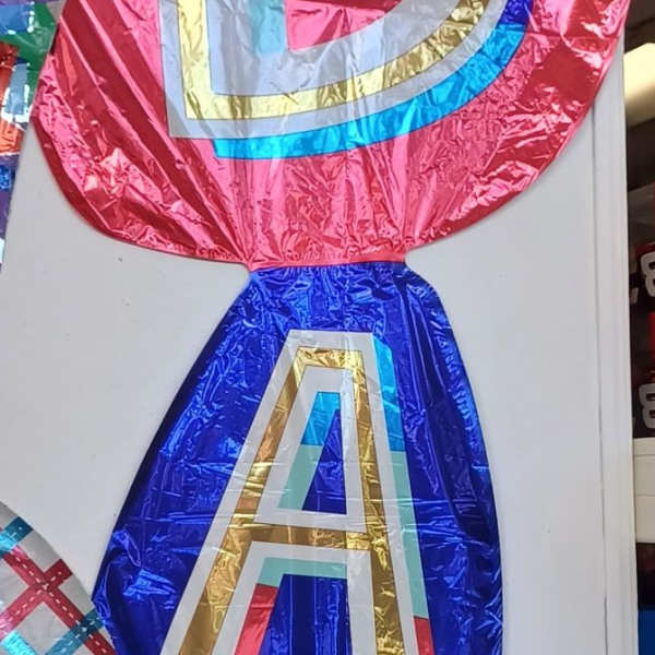 Foil balloon letters spelling "DAD" in red, blue, and teal