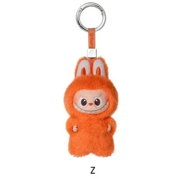 Orange plush keychain with bunny ears and a metal ring