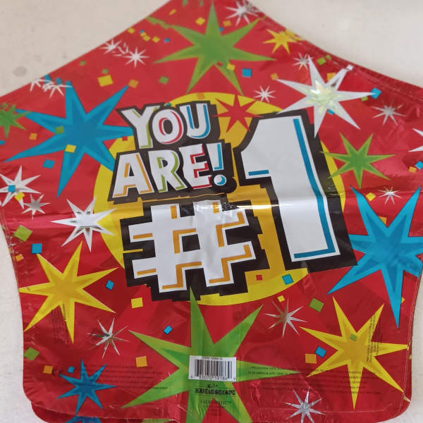 Red star-patterned balloon with "YOU ARE!" and a large number 1