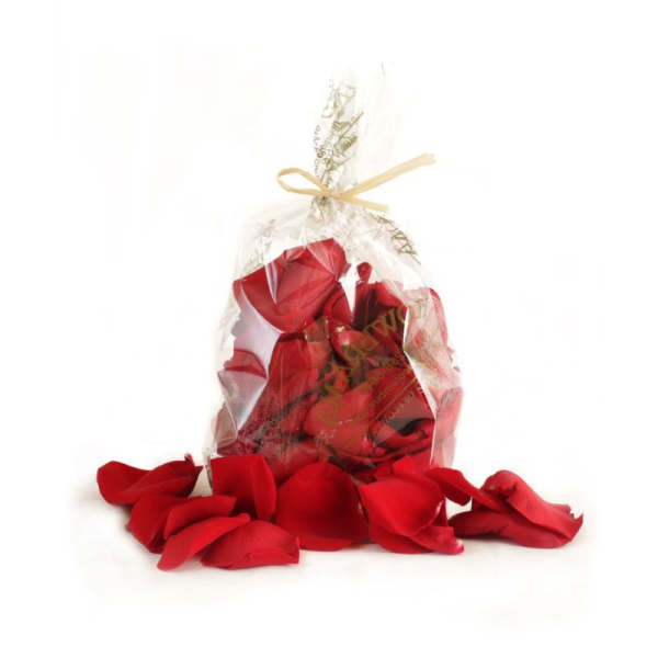 Clear gift bag filled with red rose petals and tied with a ribbon