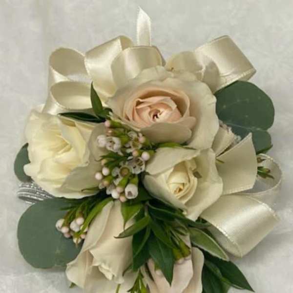 Cream rose bouquet with satin ribbon and greenery